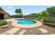 Inviting backyard pool features a stone surround and built-in grill, perfect for outdoor entertaining at 8417 W Northview Ave, Glendale, AZ 85305