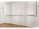 Walk-in closet with built-in shelving at 865 E Del Rio St, Chandler, AZ 85225