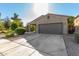 Charming single-story home features a two-car garage, driveway, and low maintenance landscaping at 865 E Del Rio St, Chandler, AZ 85225