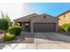 Charming single-story home with well-maintained landscaping and a two-car garage at 865 E Del Rio St, Chandler, AZ 85225