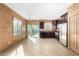 A spacious kitchen features dark cabinets, stainless steel appliances, and granite countertops at 865 E Del Rio St, Chandler, AZ 85225