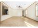 Spacious living room boasting tile flooring, neutral colors, recessed lighting, and ample natural light at 865 E Del Rio St, Chandler, AZ 85225