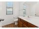 Bathroom featuring a vanity with plenty of counter space and a shower and tub combo at 8758 W Myrtle Ave, Glendale, AZ 85305