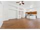 Open concept living area featuring wood floors and plenty of natural light at 8758 W Myrtle Ave, Glendale, AZ 85305