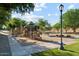 Modern playground featuring slides, climbing structures, and ample space for activities at 8758 W Myrtle Ave, Glendale, AZ 85305