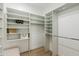 Walk-in closet with adjustable shelving, and ample storage space for organization at 8965 E Maple Dr, Scottsdale, AZ 85255