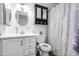 Clean bathroom featuring new vanity, mirror, and updated fixtures at 1032 E Redfield Rd, Tempe, AZ 85283