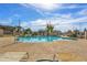 Sparkling community pool with seating under sunny blue skies at 1032 E Redfield Rd, Tempe, AZ 85283