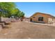 The good sized yard is surrounded by a block wall for privacy at 10646 E Enid Ave, Mesa, AZ 85208