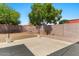 Good sized backyard shows the patio area and privacy wall at 10646 E Enid Ave, Mesa, AZ 85208