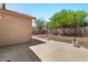 Wide view of backyard showing the privacy fence and patio at 10646 E Enid Ave, Mesa, AZ 85208