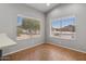Bright dining area featuring two sunny windows offering abundant natural light and views at 10646 E Enid Ave, Mesa, AZ 85208