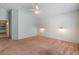 Bright main bedroom with painted walls and unique shiplap wall detail at 10646 E Enid Ave, Mesa, AZ 85208