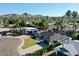 An aerial view of the home, neighborhood, and palm trees at 10844 N 37Th Way, Phoenix, AZ 85028