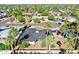 An aerial view of the house, lawn, and palm trees at 10844 N 37Th Way, Phoenix, AZ 85028