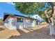 The backyard features a large lawn and privacy at 10844 N 37Th Way, Phoenix, AZ 85028
