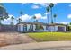 Charming single-Gathering home featuring a lush lawn, desert landscaping, and timeless architectural detail at 10844 N 37Th Way, Phoenix, AZ 85028