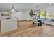 The modern kitchen offers a large island, stainless appliances, an undermount sink and a charming breakfast nook at 10844 N 37Th Way, Phoenix, AZ 85028