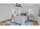 Inviting main bedroom features a ceiling fan, comfortable bedding, and a calming atmosphere at 10844 N 37Th Way, Phoenix, AZ 85028