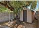 Tree swing and shed found in the backyard, a nice additional feature at 11011 N 39Th St, Phoenix, AZ 85028