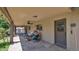 Comfortable covered patio with ceiling fans and decorative lighting, creating a relaxing outdoor space at 11011 N 39Th St, Phoenix, AZ 85028