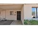 An entryway featuring a dark screen door, brick accents, and a mailbox at 11011 N 39Th St, Phoenix, AZ 85028