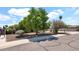 Charming single-story home surrounded by lush trees and shrubs offering shade and privacy at 11011 N 39Th St, Phoenix, AZ 85028