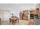 Open concept living area with a view of the front door, dining table, kitchen and a living room at 11011 N 39Th St, Phoenix, AZ 85028