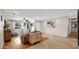Spacious living area with stylish decor, hardwood and tile flooring, and plenty of natural light at 11011 N 39Th St, Phoenix, AZ 85028