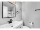 Bathroom featuring modern vanity, mirror, toilet, and towel rack at 1180 W Rosal Ave, Apache Junction, AZ 85120