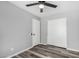 Neutral bedroom featuring a closet and ceiling fan at 1180 W Rosal Ave, Apache Junction, AZ 85120