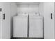 Convenient laundry room featuring a full-size washer and dryer at 1180 W Rosal Ave, Apache Junction, AZ 85120