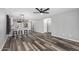 Open-concept living area with hard surface flooring, lots of natural light at 1180 W Rosal Ave, Apache Junction, AZ 85120