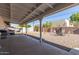 Relaxing covered patio and backyard offering a spacious and open layout at 1235 E Dover St, Mesa, AZ 85203