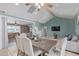 Inviting dining area with stylish furniture and an open view to the living room at 1235 E Dover St, Mesa, AZ 85203