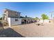 Backyard view featuring covered patio and plenty of space for entertaining at 1235 E Dover St, Mesa, AZ 85203
