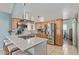 Well-equipped kitchen with an island cooktop, stainless steel appliances, and modern countertops at 1235 E Dover St, Mesa, AZ 85203