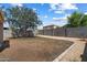Large backyard with block wall and landscaping with room for entertaining at 12410 W Flores Dr, El Mirage, AZ 85335