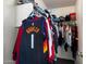 Walk-in closet featuring ample shelving and hanging space, perfect for organizing clothes and accessories at 12410 W Flores Dr, El Mirage, AZ 85335