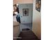 Carpeted staircase landing with tile floors and decorative accents on the wall at 1309 W Park St, Phoenix, AZ 85041