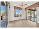 Bright breakfast nook with large windows and sliding glass door access to outdoor patio at 15101 W Waterford Dr, Surprise, AZ 85374