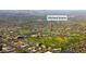 Panoramic aerial view of Kierland Greens, showcasing the community's layout, golf course, and nearby urban amenities at 15221 N Clubgate Dr # 2044, Scottsdale, AZ 85254