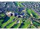 Breathtaking aerial view showcases the resort, golf course, lush landscaping and surrounding community; perfect for recreation and relaxation at 15221 N Clubgate Dr # 2044, Scottsdale, AZ 85254