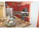 Stylish kitchen with stainless steel appliances, granite countertops, and ample cabinet space at 15221 N Clubgate Dr # 2044, Scottsdale, AZ 85254