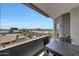 Balcony view with seating, offering panoramic vistas of the community and distant mountain range at 15802 N 71St St # 552, Scottsdale, AZ 85254