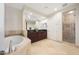 Bright bathroom with double vanity, soaking tub, and walk-in shower with glass door at 15802 N 71St St # 552, Scottsdale, AZ 85254