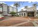 A well-maintained building exterior with neatly landscaped surroundings and ample parking space at 15802 N 71St St # 552, Scottsdale, AZ 85254