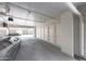 Clean and organized garage with multiple storage units and ample parking space for vehicles at 15802 N 71St St # 552, Scottsdale, AZ 85254