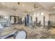 Well-equipped gym with treadmills, weight machines, and multiple ceiling fans for a comfortable workout experience at 15802 N 71St St # 552, Scottsdale, AZ 85254