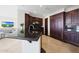 Modern kitchen features dark cabinets, sleek countertops, and stainless steel appliances at 15802 N 71St St # 552, Scottsdale, AZ 85254